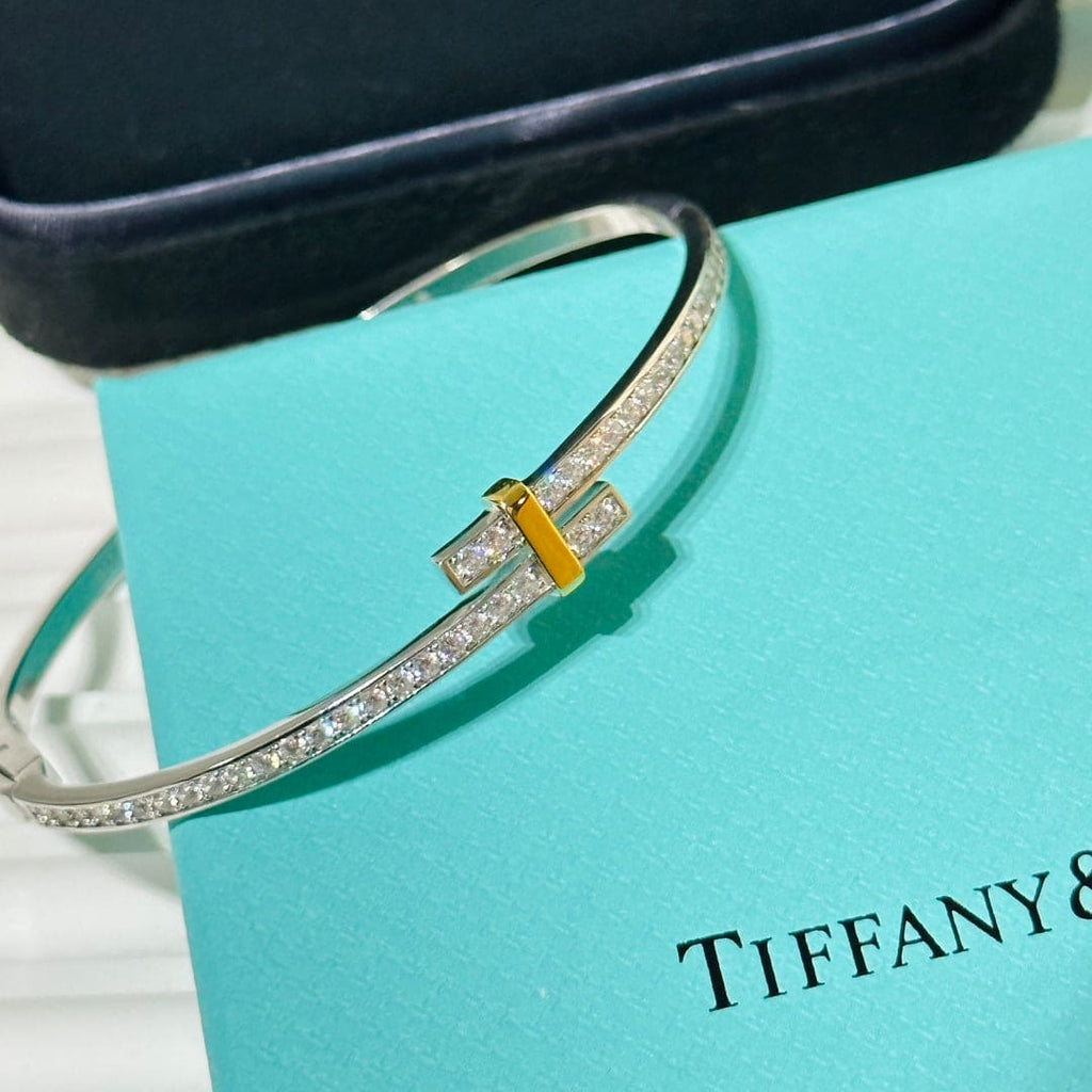 18K Tiffany Edge Hinged Bypass Bangle Bracelet
